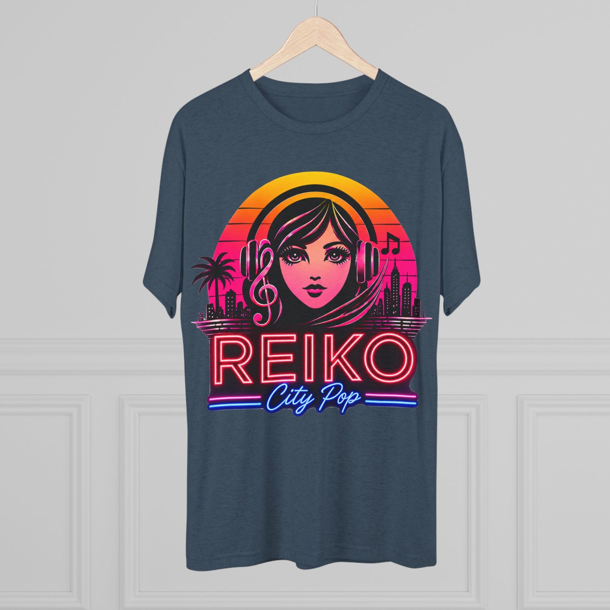 Front view of the Reiko Takahashi City Pop Sunset Logo Tee in Indigo, printed on a premium Next Level tri-blend T-shirt and displayed on a wooden hanger. Features retro neon artwork inspired by the song "Sunset Road."