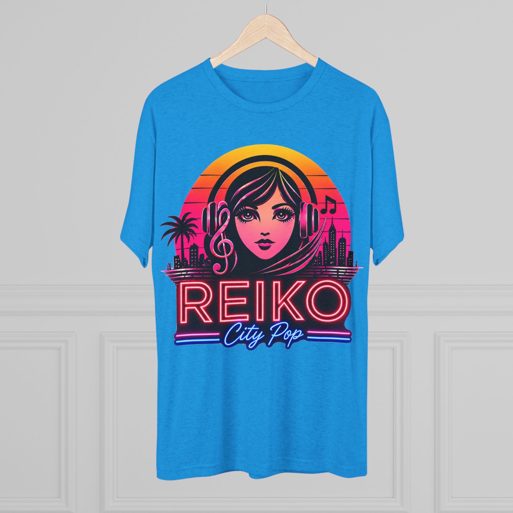 Front view of the Reiko Takahashi City Pop Sunset Logo Tee in Vintage Turquoise, printed on a premium Next Level tri-blend T-shirt and displayed on a wooden hanger. Features retro neon artwork inspired by the song "Sunset Road."